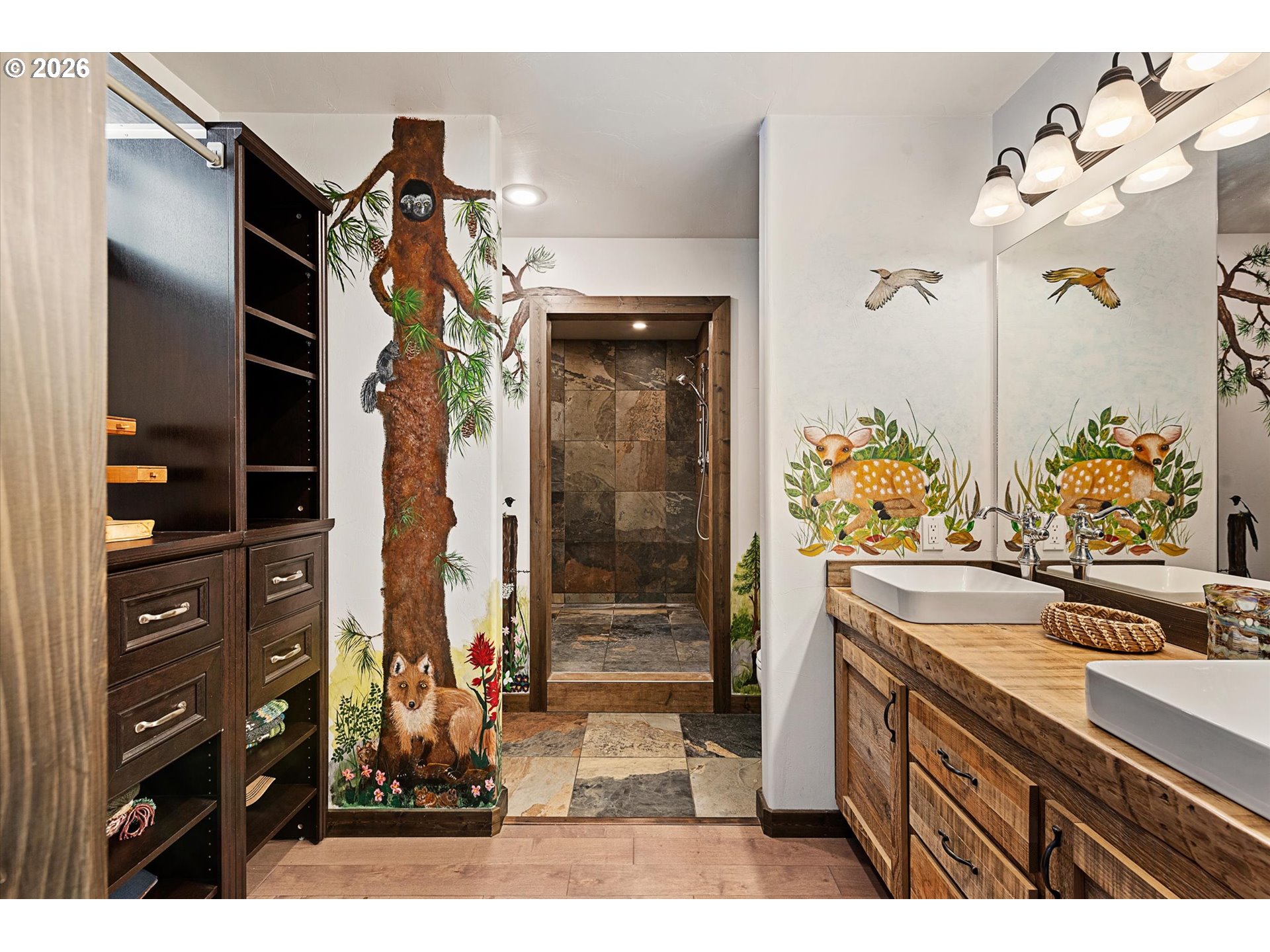 60989 Old Ski Run Road Joseph, OR 97846 - Photo 16 of 46 a bathroom with a sink double vanity and a shower