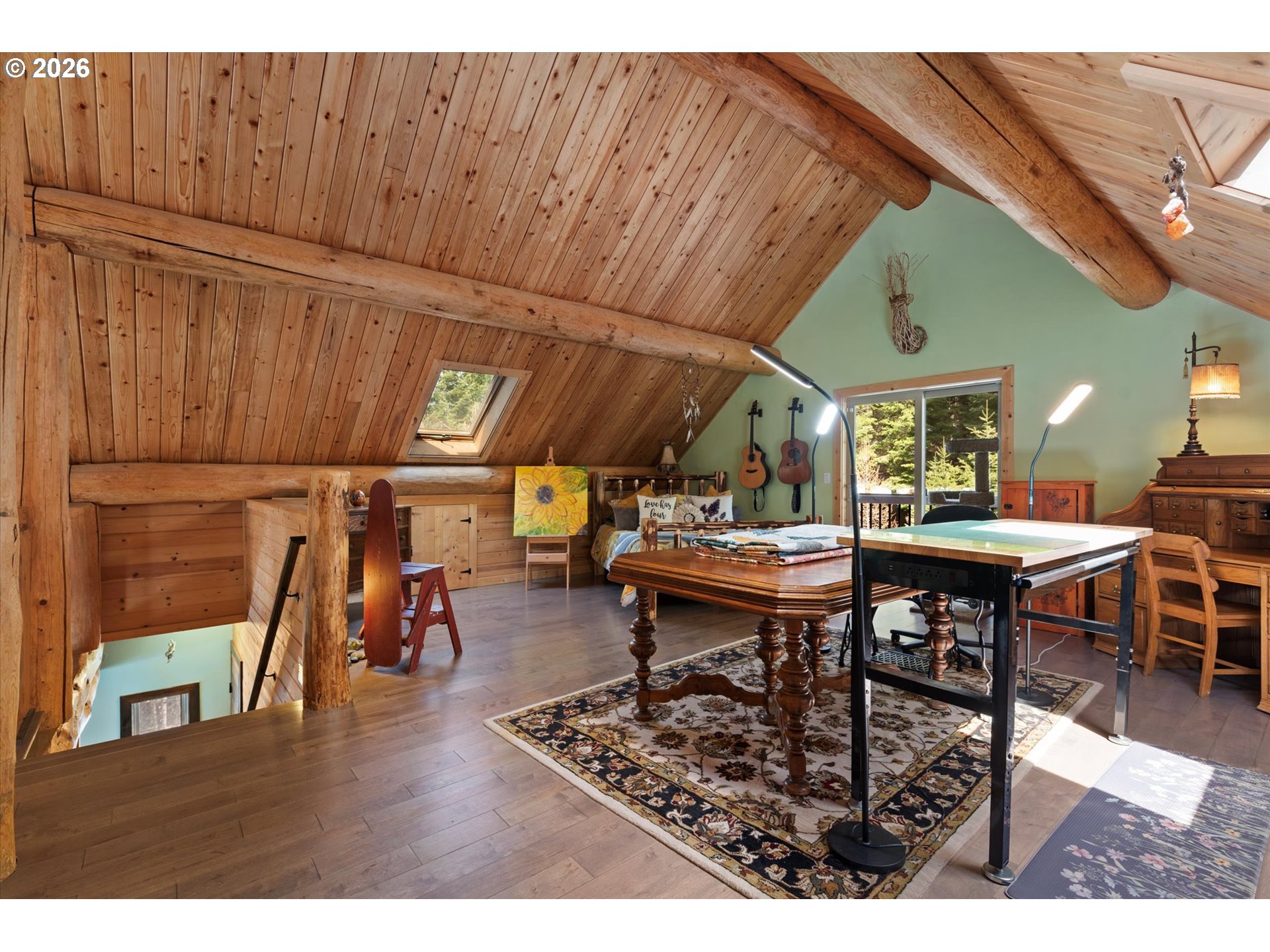 60989 Old Ski Run Road Joseph, OR 97846 - Photo 22 of 46 a dining room with wooden floor table and chairs
