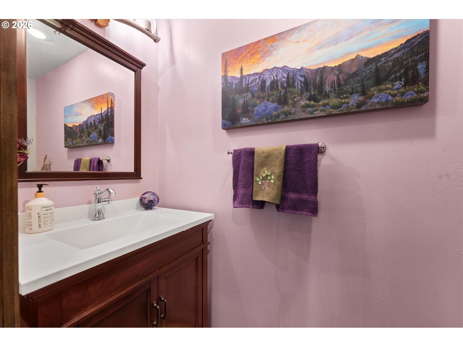 60989 Old Ski Run Road Joseph, OR 97846 - Photo 28 of 46 a bathroom with a sink mirror and vanity