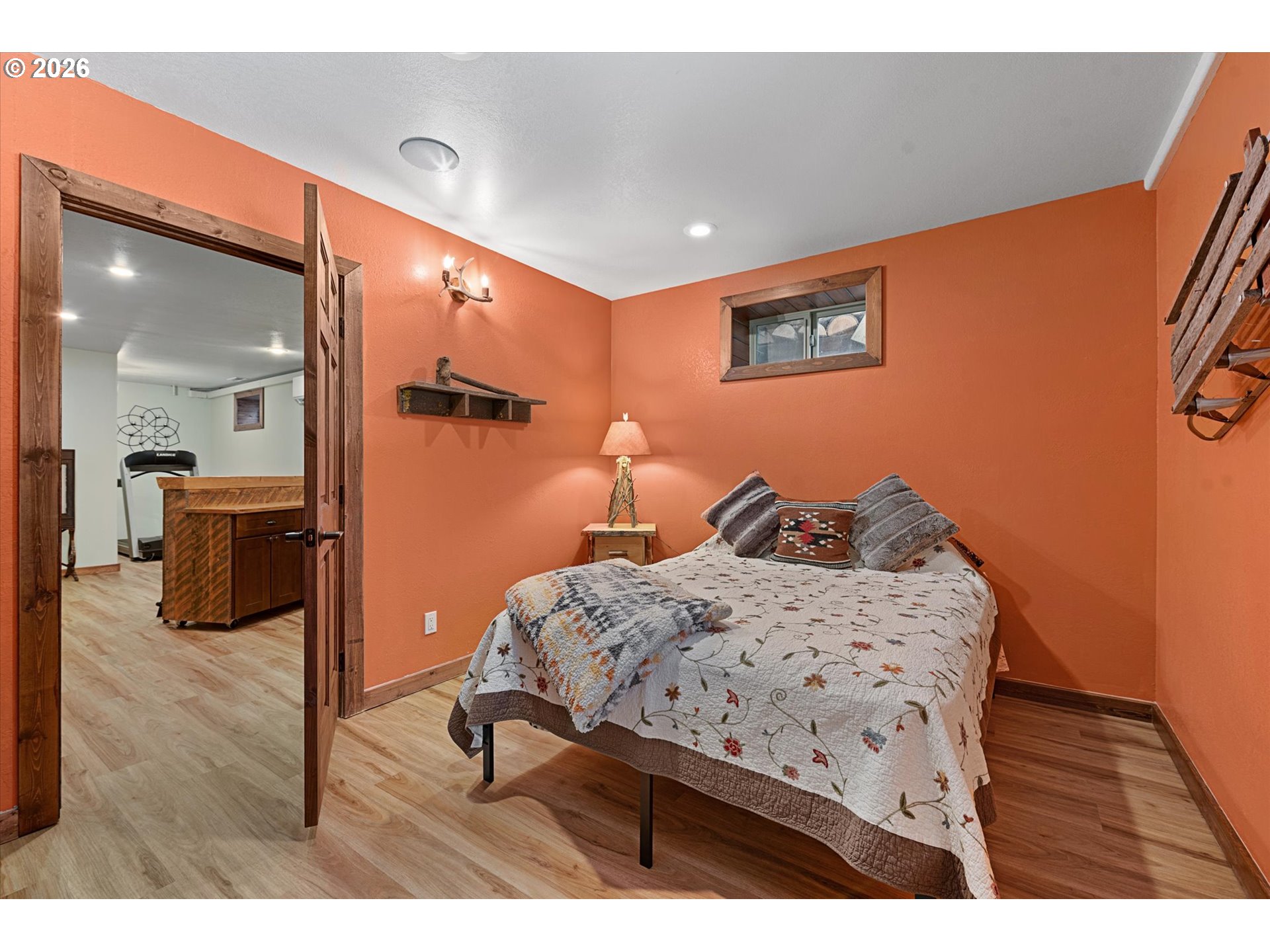 60989 Old Ski Run Road Joseph, OR 97846 - Photo 35 of 46 a bedroom with a bed and a table with mirror