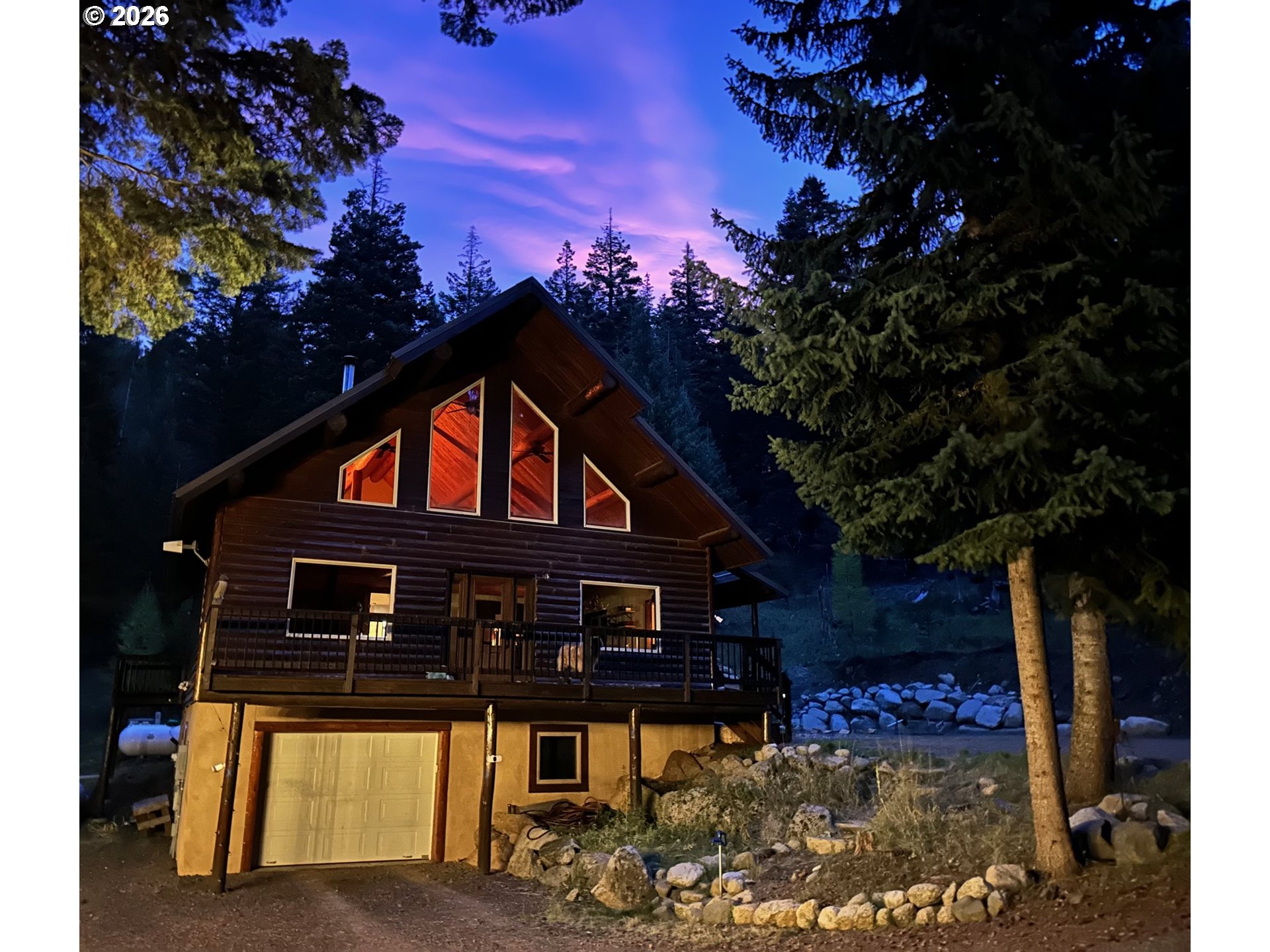 60989 Old Ski Run Road Joseph, OR 97846 - Photo 42 of 46 front view of a house with a small yard