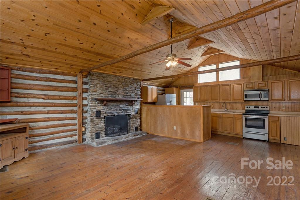 242 Colony Road Hendersonville, NC 28792 - Photo 8 of 14 a view of a livingroom with a fireplace