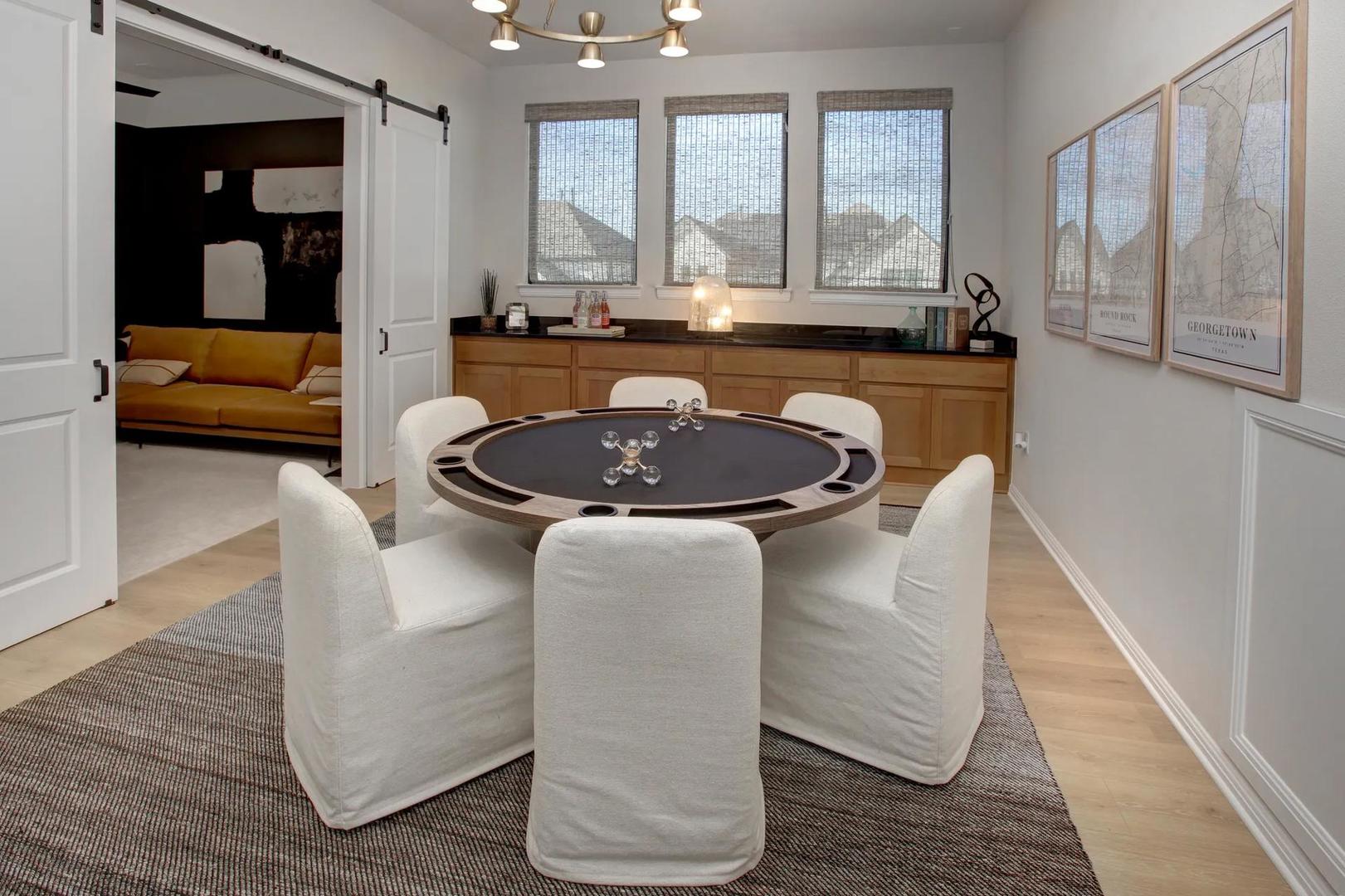 2033 Morning Mist Drive Georgetown, TX 78628 - Photo 22 of 36 a dining room with fireplace furniture and a large window