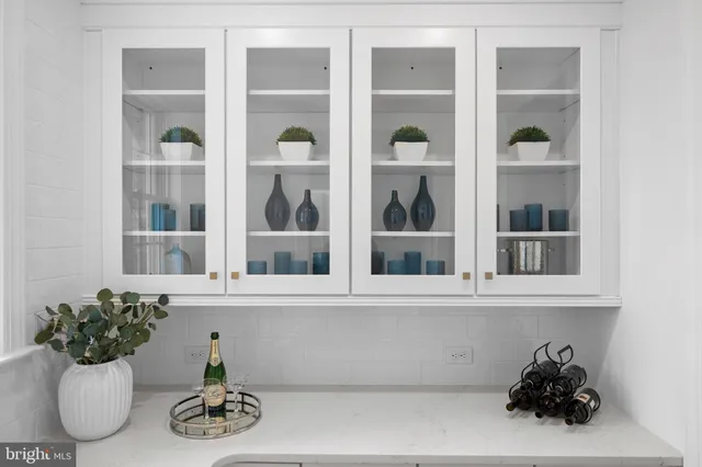a bathroom with a sink and a window