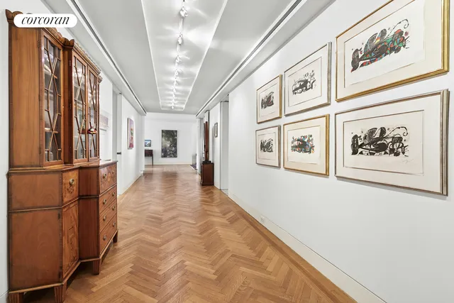 a kitchen with granite countertop a refrigerator and a sink
