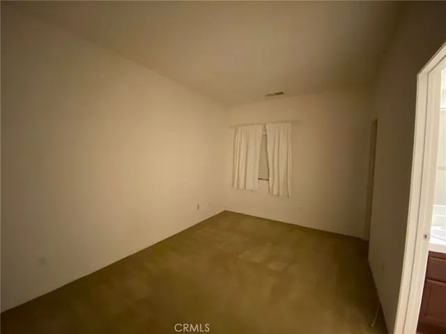 an empty room with a door