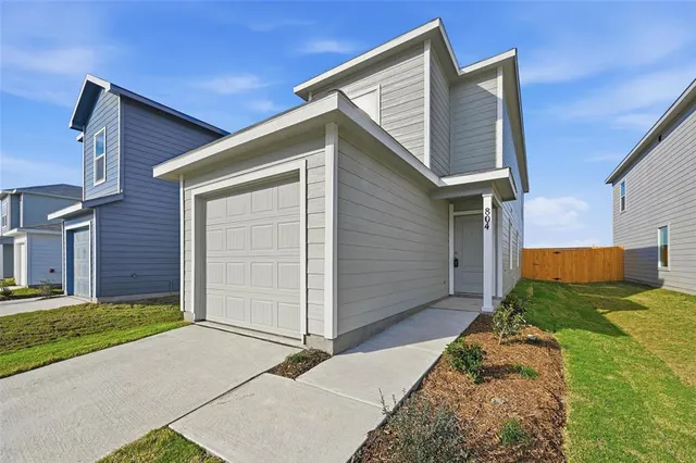 a view of backyard of house