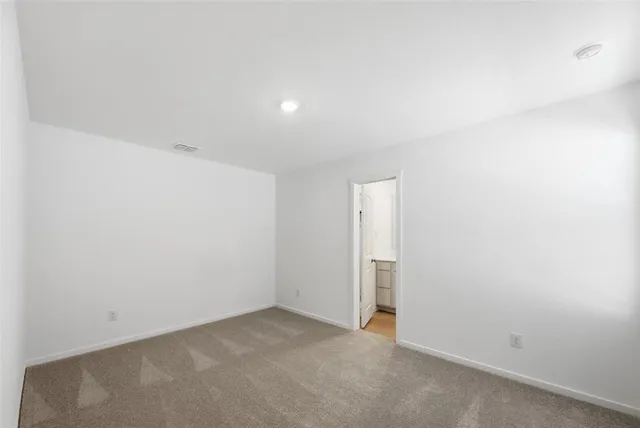 an empty room with an entryway