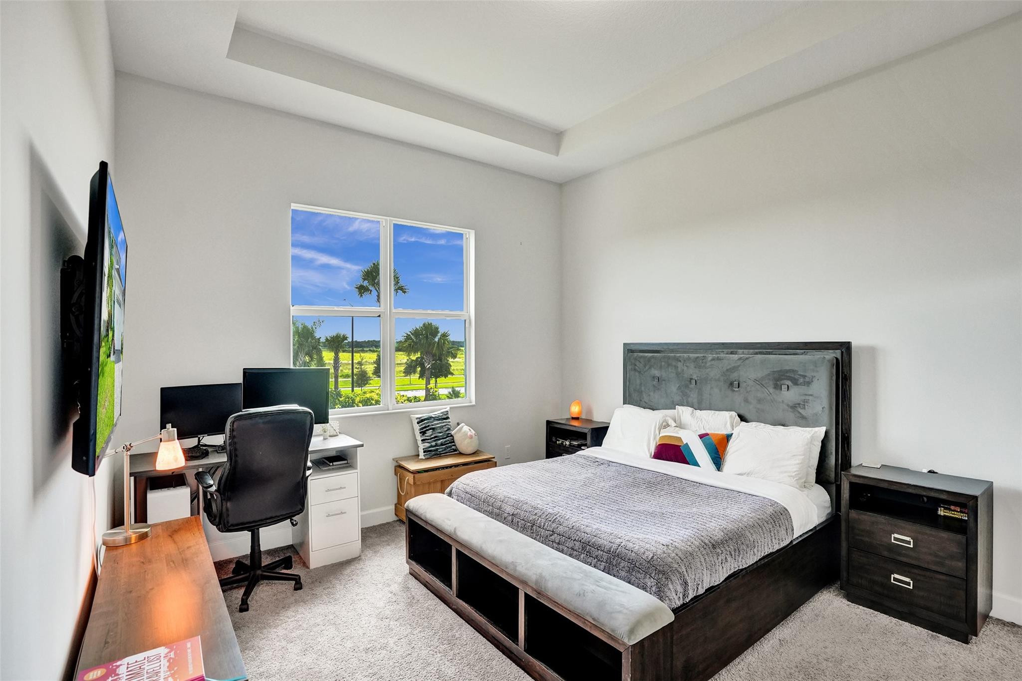 5416 Macoon Way Loxahatchee, FL 33470 - Photo 14 of 43 a bedroom with a bed and a desk