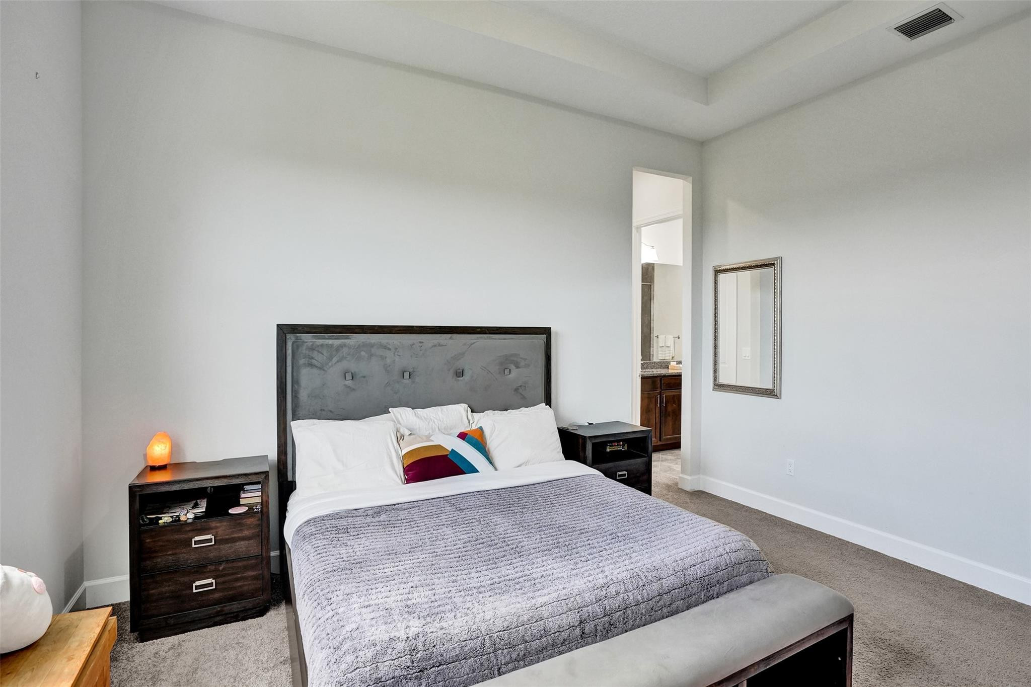 5416 Macoon Way Loxahatchee, FL 33470 - Photo 15 of 43 a bedroom with a bed and window