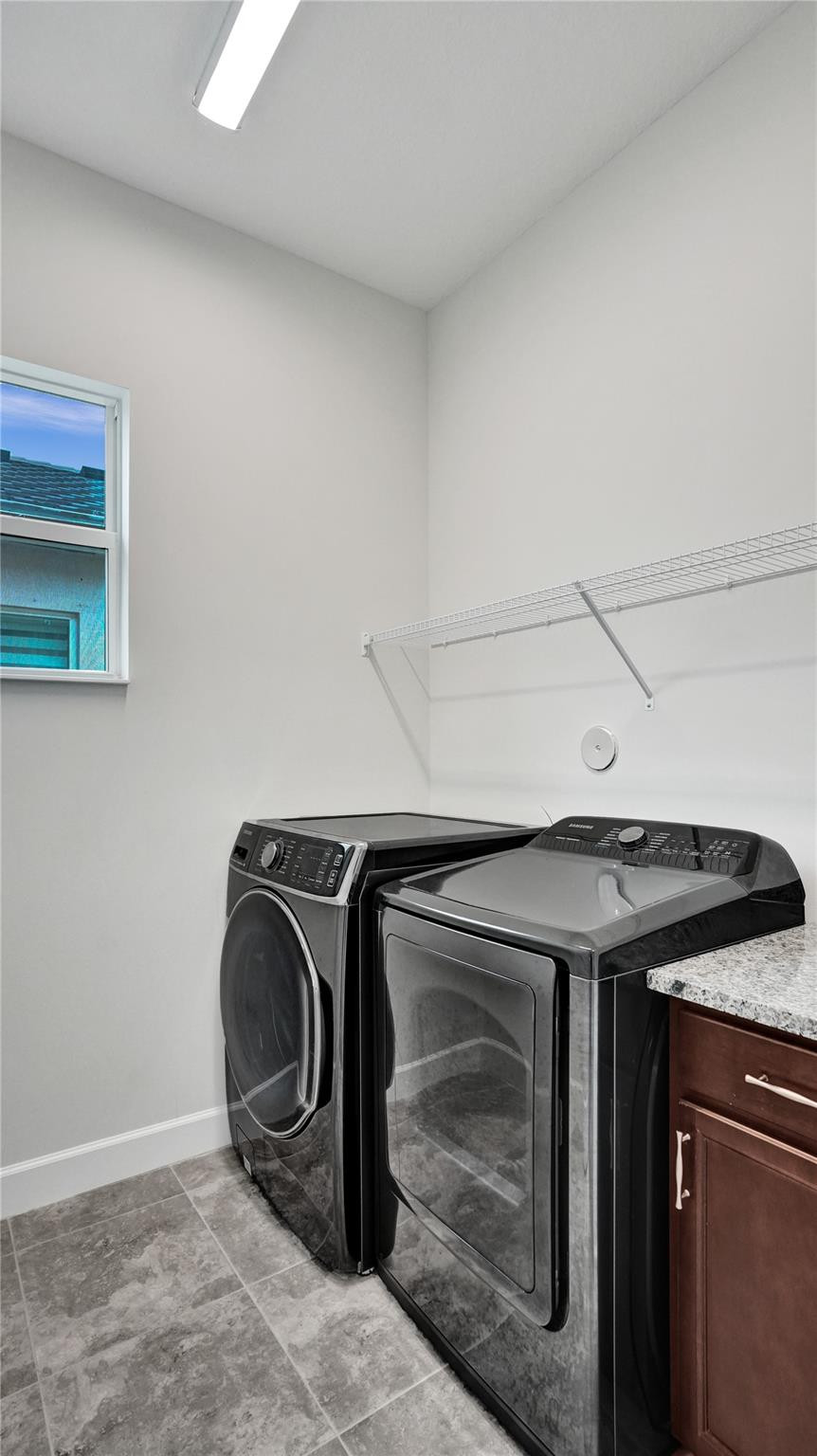 5416 Macoon Way Loxahatchee, FL 33470 - Photo 20 of 43 a utility room with dryer and washer