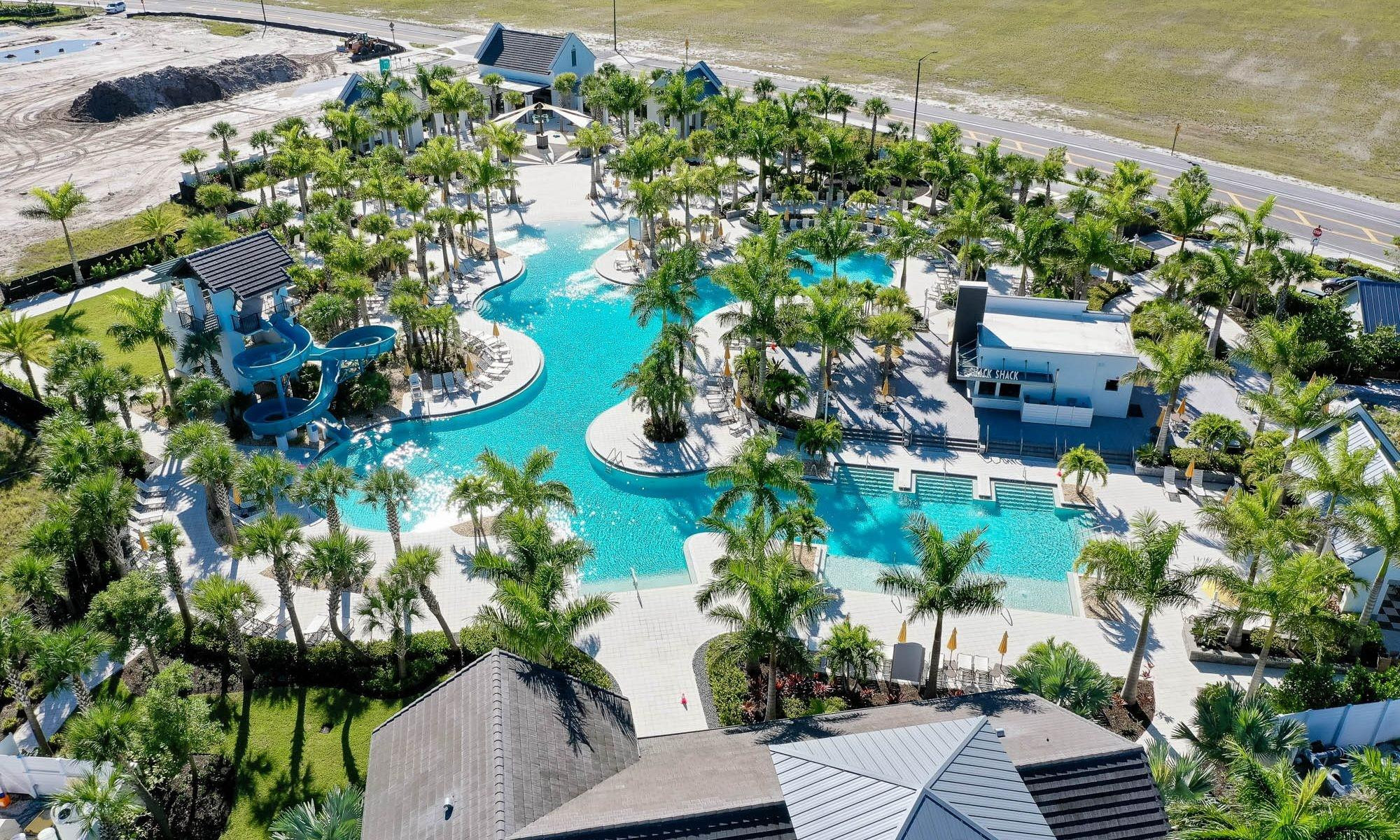 5416 Macoon Way Loxahatchee, FL 33470 - Photo 6 of 43 a bunch of flowers in a garden