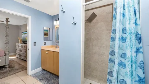 a bathroom with a sink and mirror