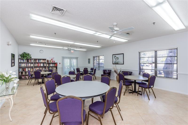 2334 South Cypress Bend Drive, Unit 204 Pompano Beach, FL 33069 - Photo 20 of 25 a view of a dining room with furniture and window