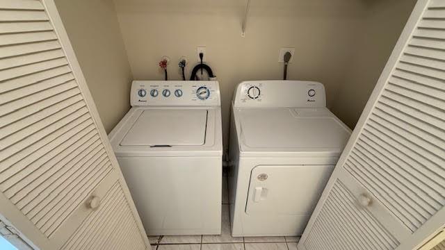 2334 South Cypress Bend Drive, Unit 204 Pompano Beach, FL 33069 - Photo 4 of 25 a utility room with dryer and washer