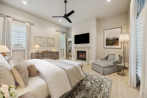 a bedroom with a bed and a couch