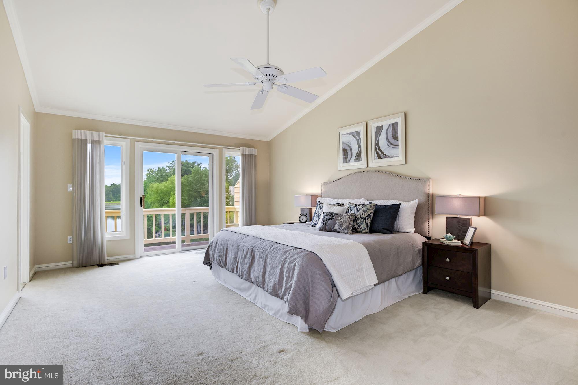 11504 Hemingway Drive Reston, VA 20194 - Photo 13 of 30 a spacious bedroom with a large bed and a large window