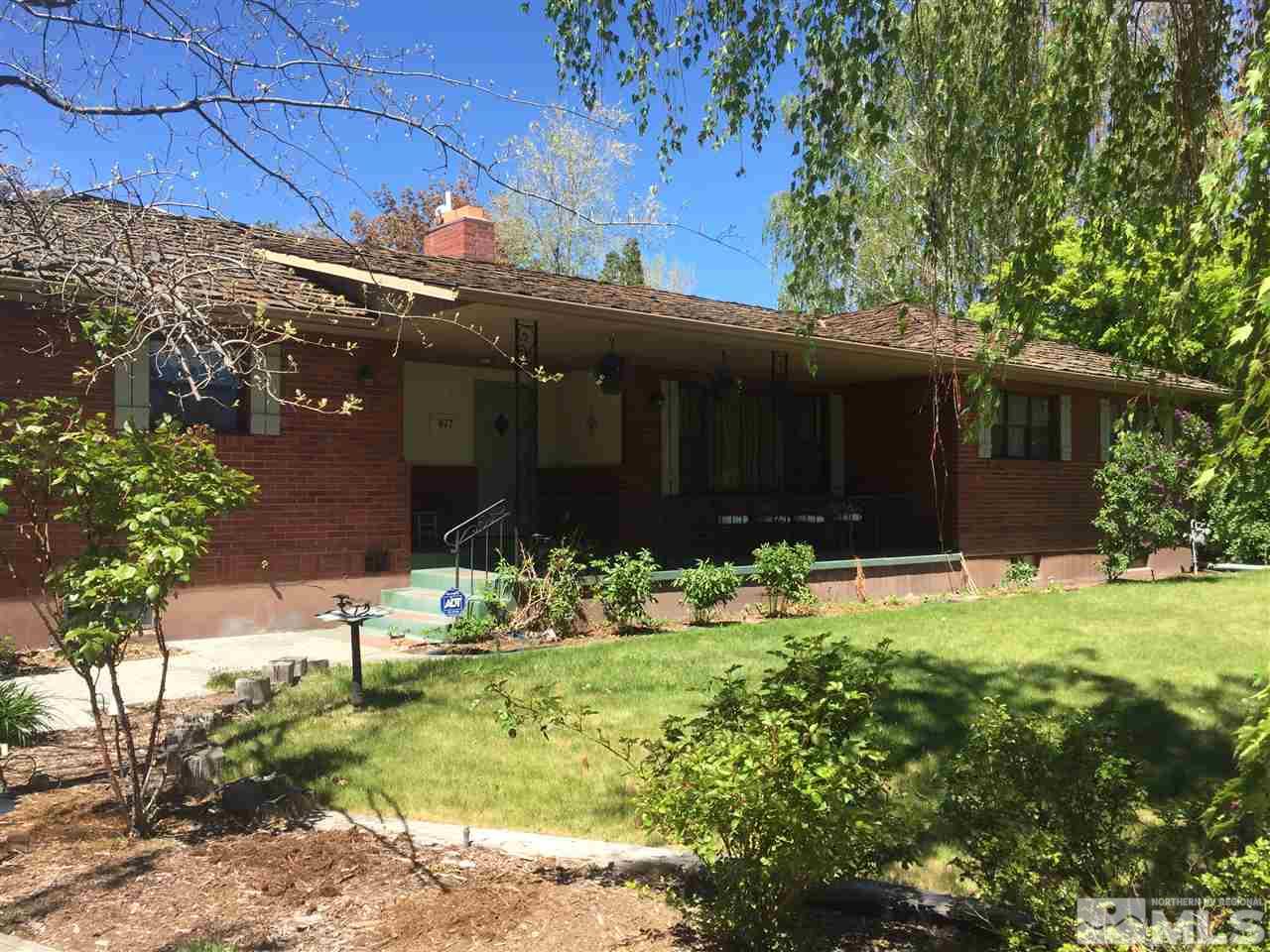 877 Daniel Drive Reno, NV 89509 - Photo 1 of 1 a house with trees in front of it