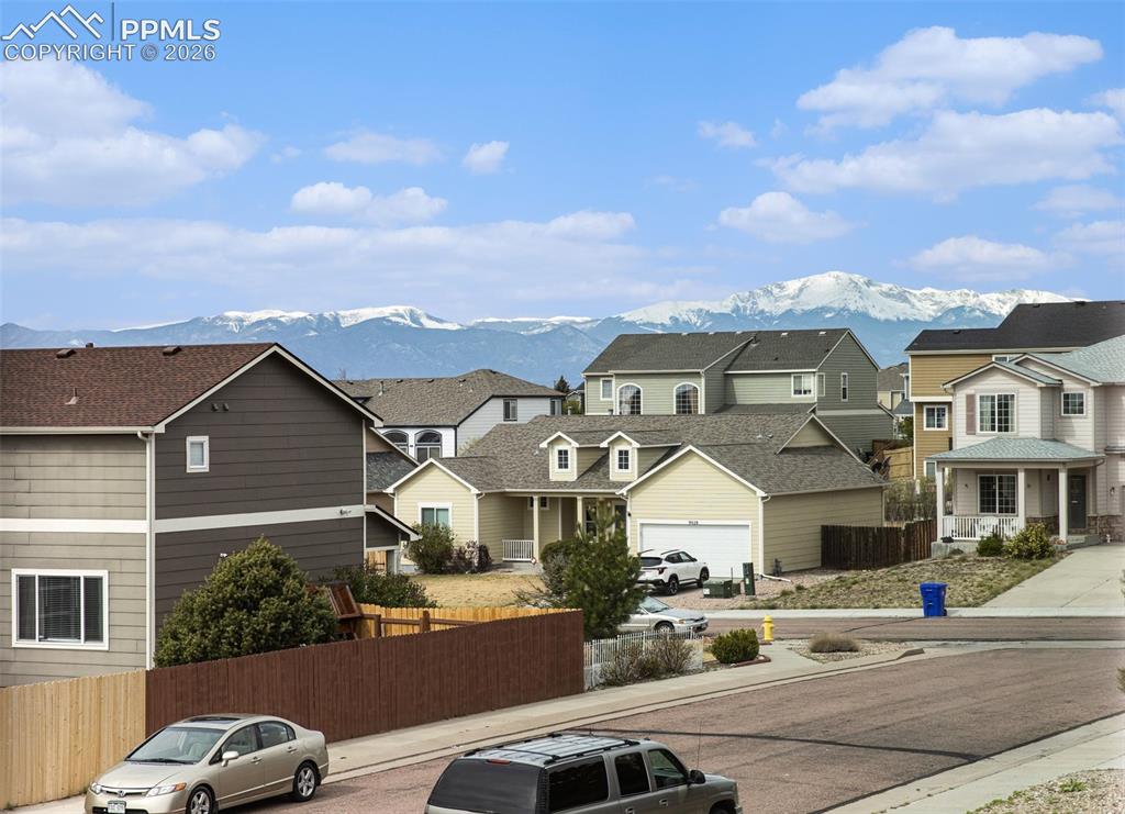 12210 Crystal Downs Road Peyton, CO 80831 - Photo 36 of 40 a front view of a houses with a yard