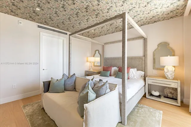 a bathroom with a double vanity sink and mirror