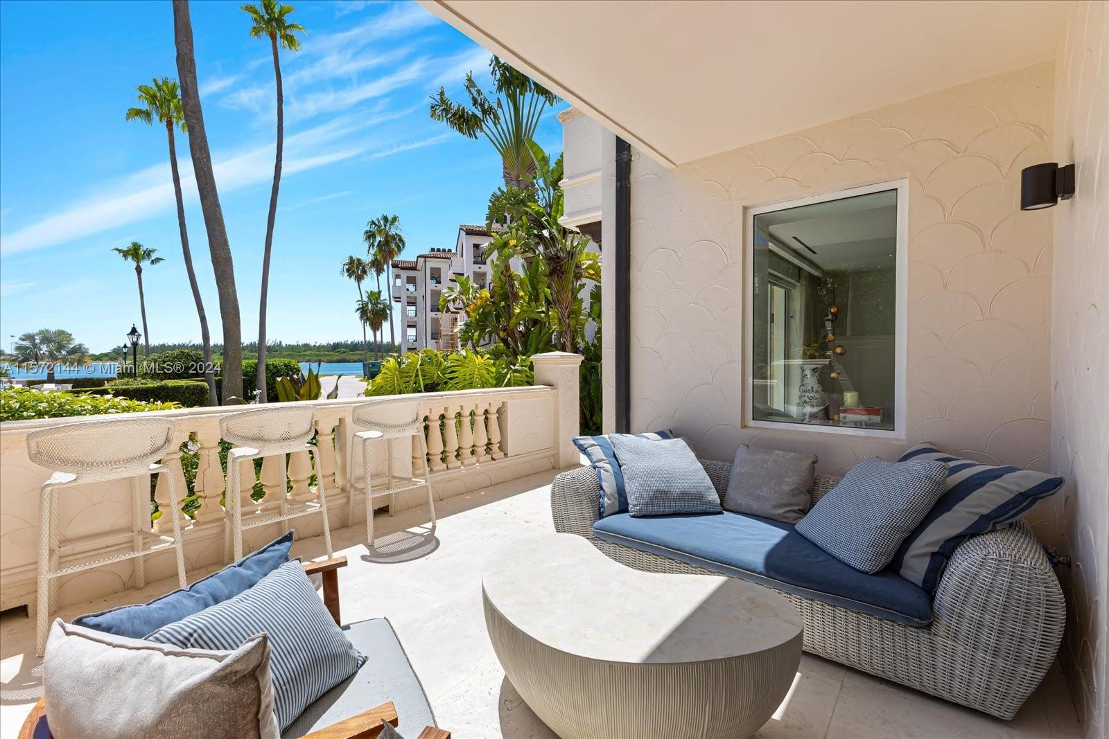 2113 Fisher Island Drive, Unit 2113 Miami Beach, FL 33109 - Photo 31 of 49 a view of balcony with furniture