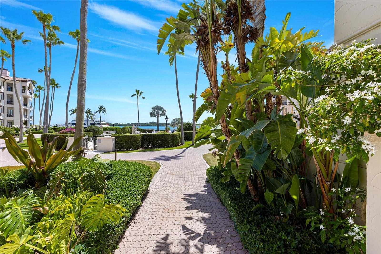 2113 Fisher Island Drive, Unit 2113 Miami Beach, FL 33109 - Photo 34 of 49 a view of a potted flower in a garden