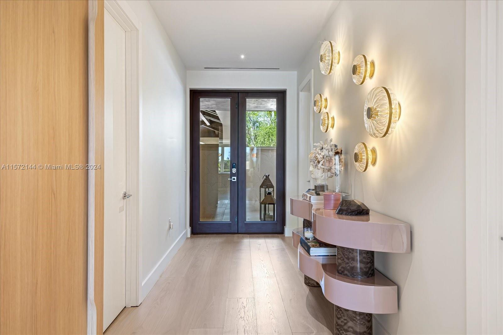 2113 Fisher Island Drive, Unit 2113 Miami Beach, FL 33109 - Photo 10 of 49 wooden floor in a gallery