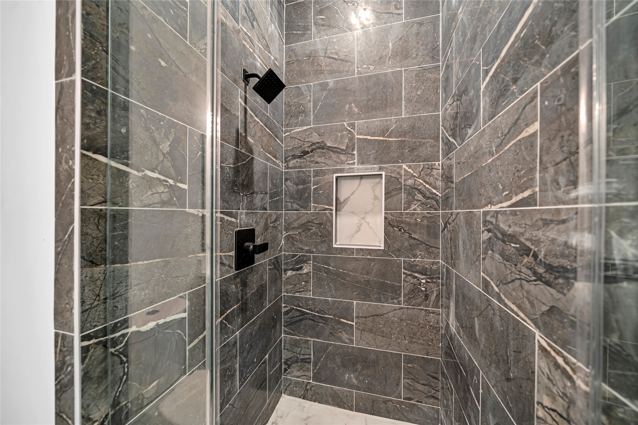 4834 Higgins Street, Unit B Houston, TX 77033 - Photo 27 of 34 a bathroom with a shower