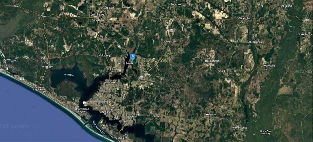 5413 Bay Head Road Youngstown, FL 32466 - Photo 5 of 6 a view of a garden