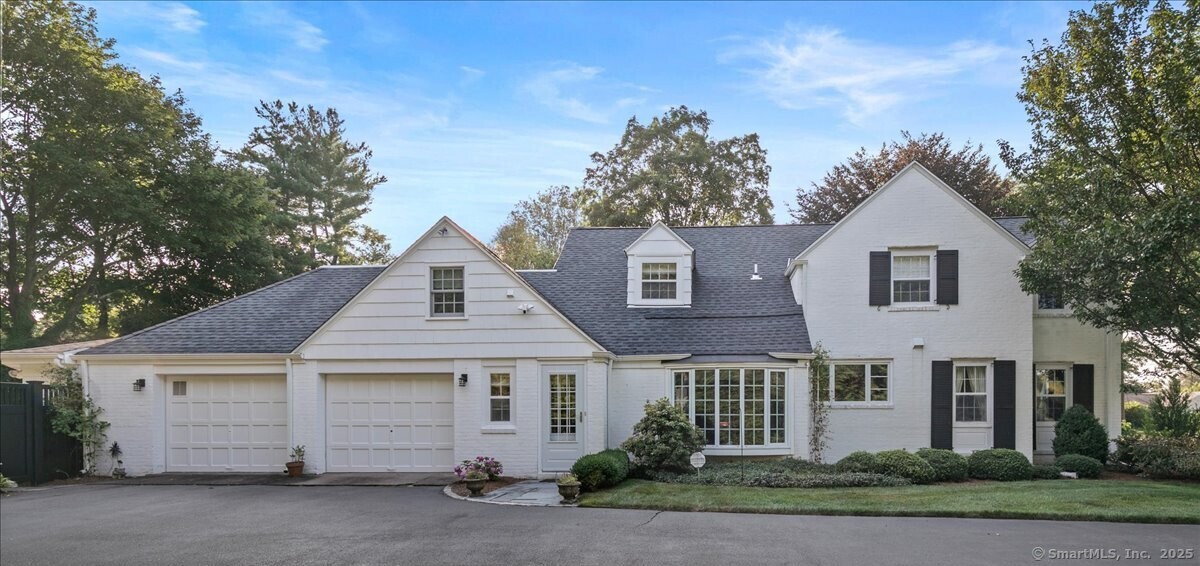 26 Old Orchard Road North Haven, CT 06473 - Photo 2 of 38 a front view of a house with a garden