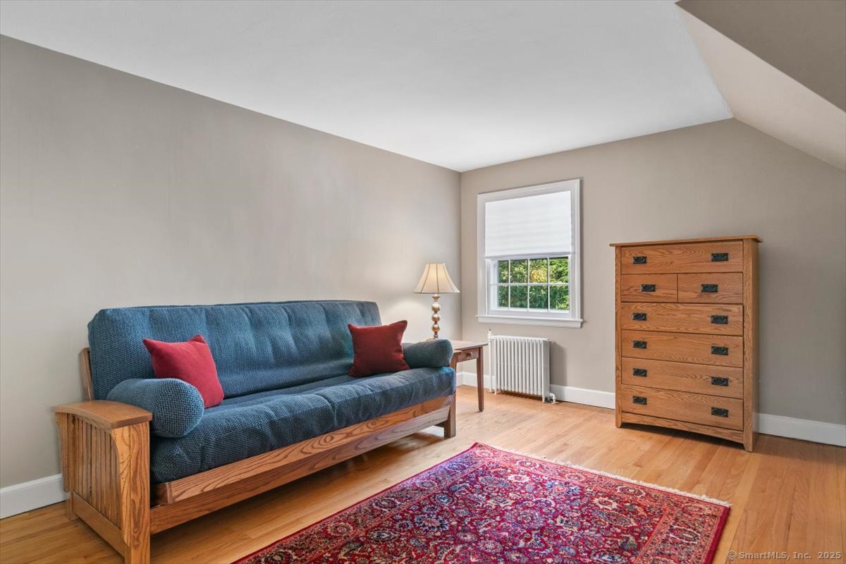26 Old Orchard Road North Haven, CT 06473 - Photo 32 of 38 a living room with furniture and a window