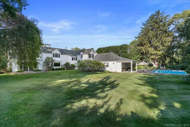 a view of a house with a big yard