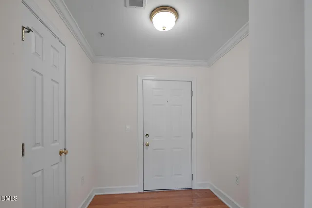 an empty room with a hallway