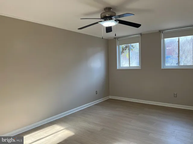 an empty room with windows