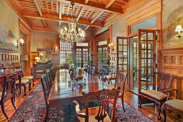a view of a chairs and table in a patio