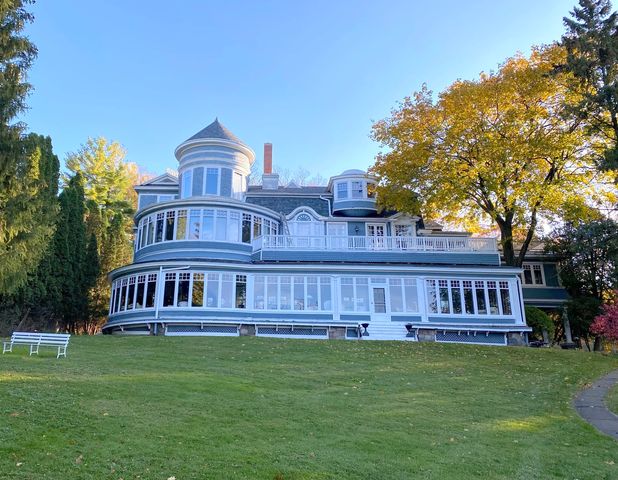 a view of a house with a garden