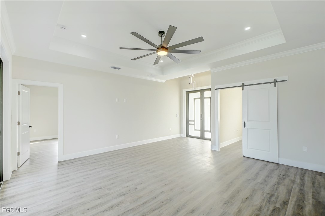 3108 20th Street Southwest Lehigh Acres, FL 33976 - Photo 11 of 36 a view of an empty room with a window