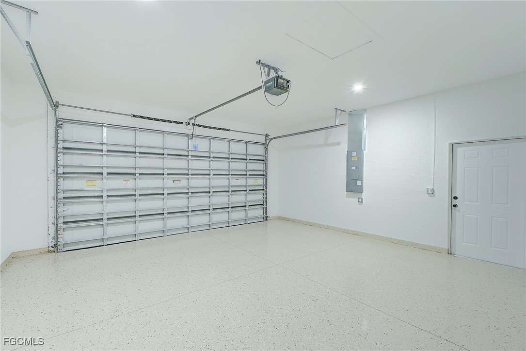 3108 20th Street Southwest Lehigh Acres, FL 33976 - Photo 31 of 36 a view of a garage