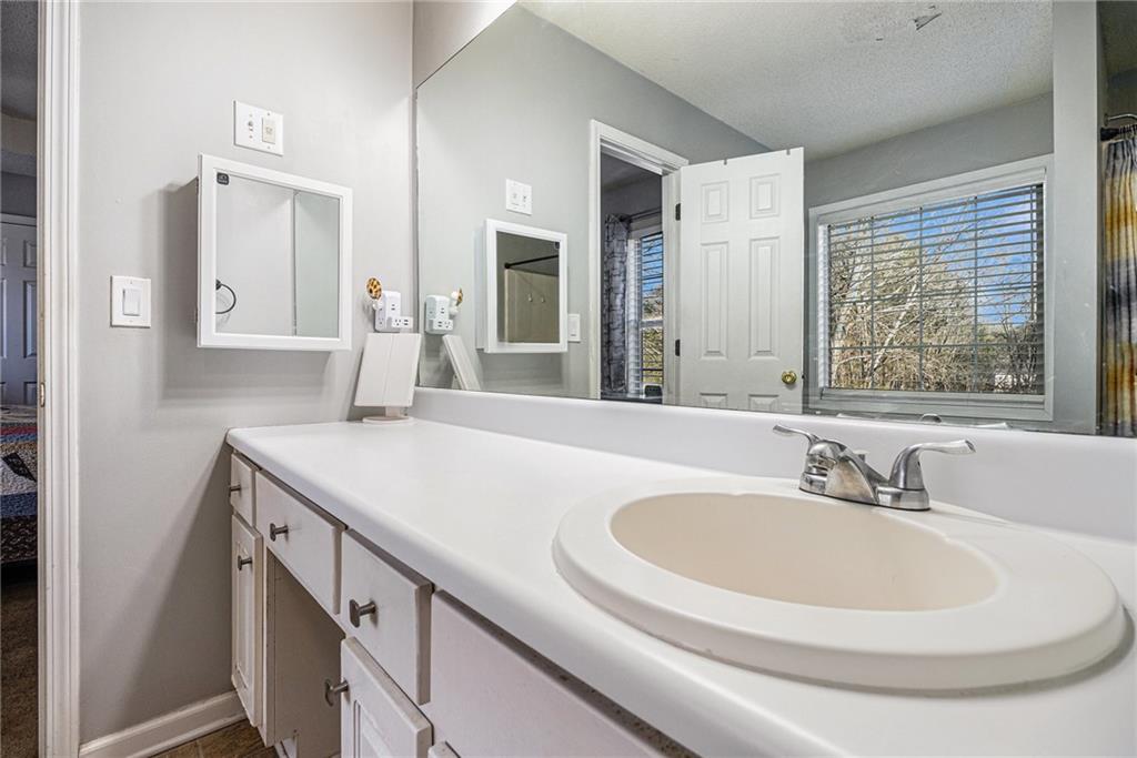 118 Manning Mill Road Adairsville, GA 30103 - Photo 13 of 19 a bathroom with a sink and a bathtub