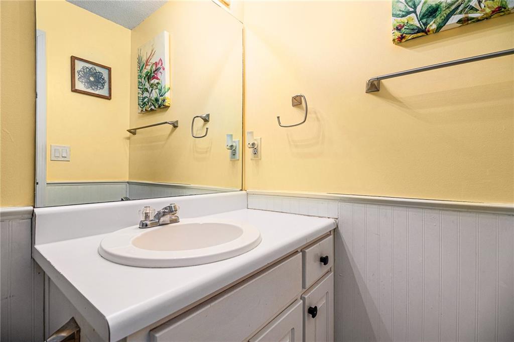 118 Manning Mill Road Adairsville, GA 30103 - Photo 14 of 19 a bathroom with a sink and a mirror
