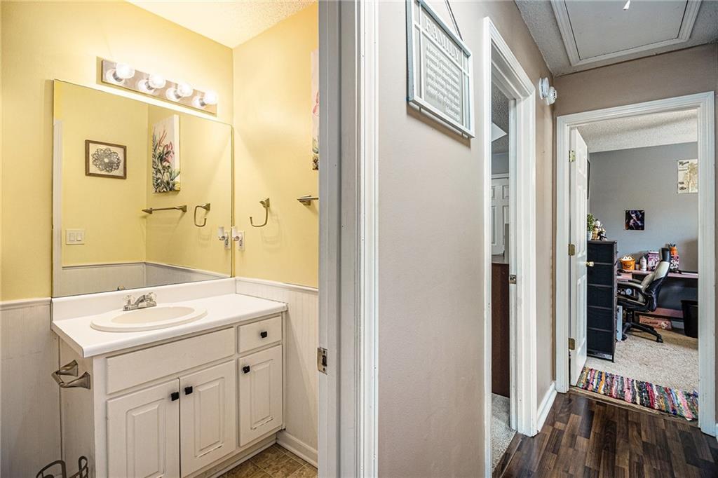 118 Manning Mill Road Adairsville, GA 30103 - Photo 16 of 19 a bathroom with a sink a mirror and a shower