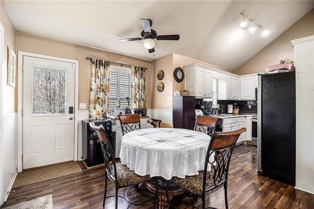 118 Manning Mill Road Adairsville, GA 30103 - Photo 5 of 19 a view of a dining room with furniture window and wooden floor