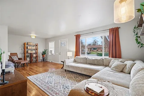 a living room with furniture and a couch