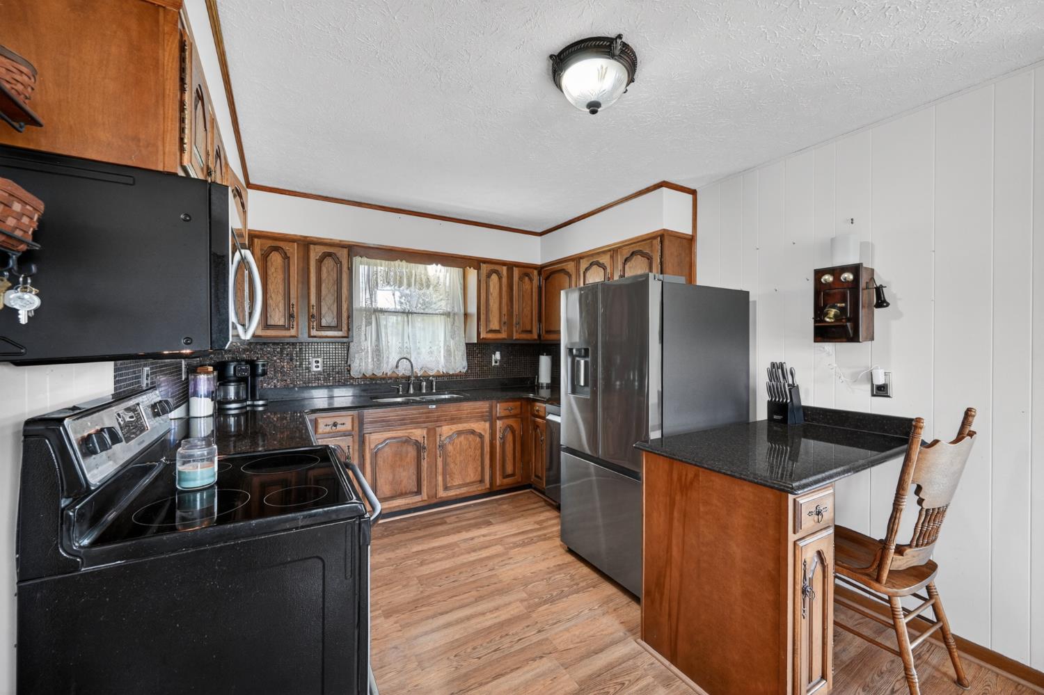 8093 Highway 350 Aurora, IN 47001 - Photo 13 of 50 User- friendly kitchen boasting nice granit countertop-