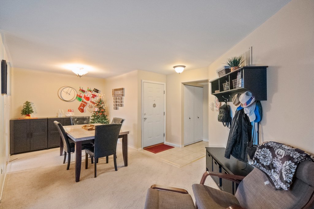 918 East Kings Row, Unit 1 Palatine, IL 60074 - Photo 13 of 36 a view of a livingroom and dining room