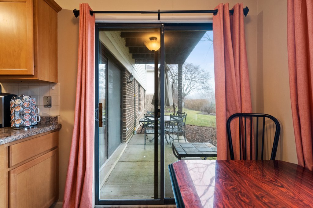 918 East Kings Row, Unit 1 Palatine, IL 60074 - Photo 22 of 36 a view of hallway with furniture and a mirror