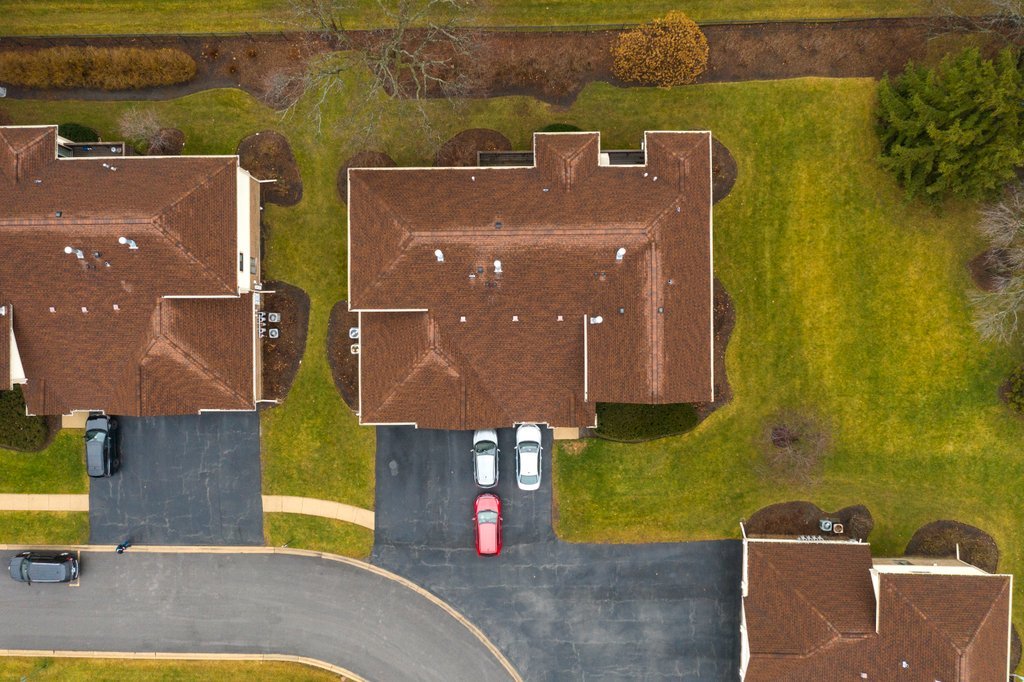 918 East Kings Row, Unit 1 Palatine, IL 60074 - Photo 6 of 36 an aerial view of a house with a swimming pool