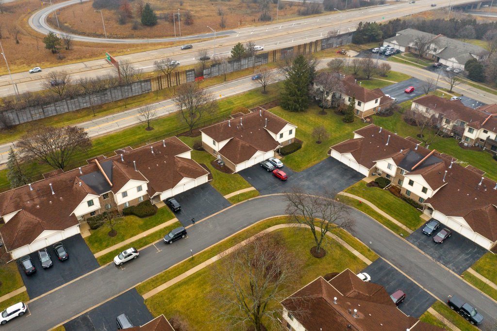 918 East Kings Row, Unit 1 Palatine, IL 60074 - Photo 8 of 36 an aerial view of a house with a swimming pool