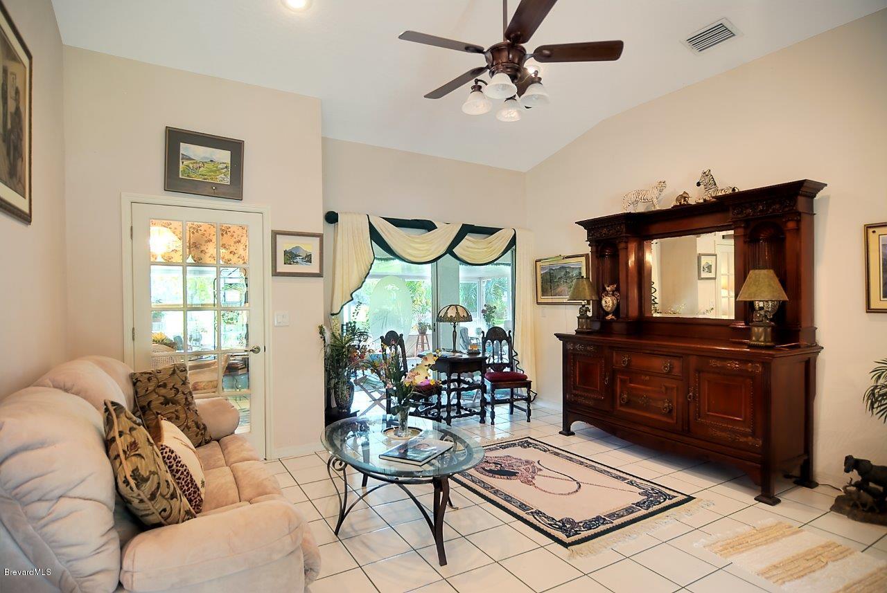 1180 Meadowbrook Road Northeast Palm Bay, FL 32905 - Photo 2 of 14 living (3).jpg