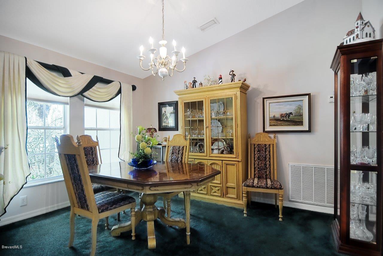1180 Meadowbrook Road Northeast Palm Bay, FL 32905 - Photo 3 of 14 dining (3).jpg